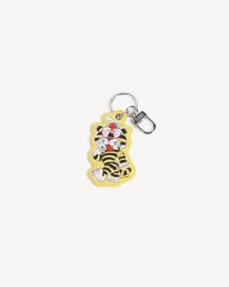 Colgante «Kenzo Cartoon» en metal y piel