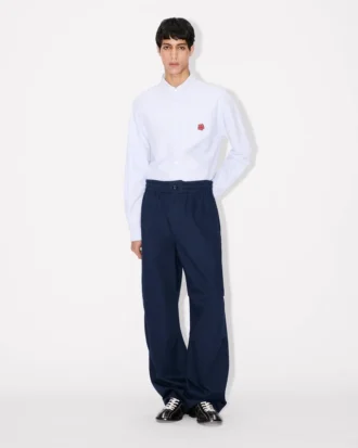 Pantalones elásticos de algodón con diseño en espiga