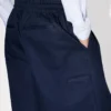 Pantalones elásticos de algodón con diseño en espiga Pantalones elásticos de algodón con diseño en espiga