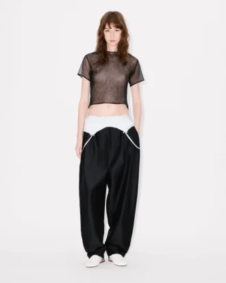 Pantalones entallados con pliegues de lana virgen y seda