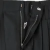 Pantalones entallados con pliegues de lana virgen y seda